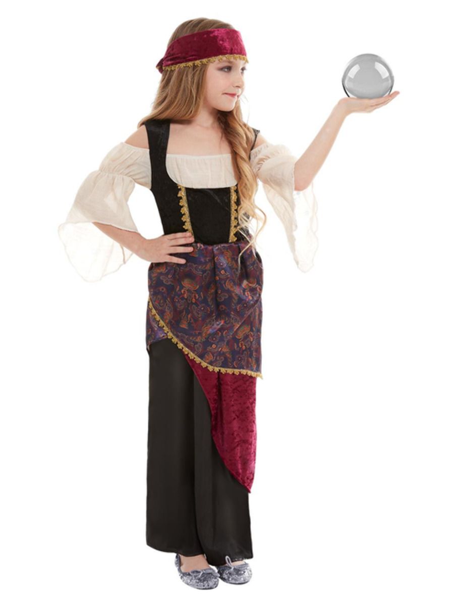 girl in fortune teller costume with glass ball