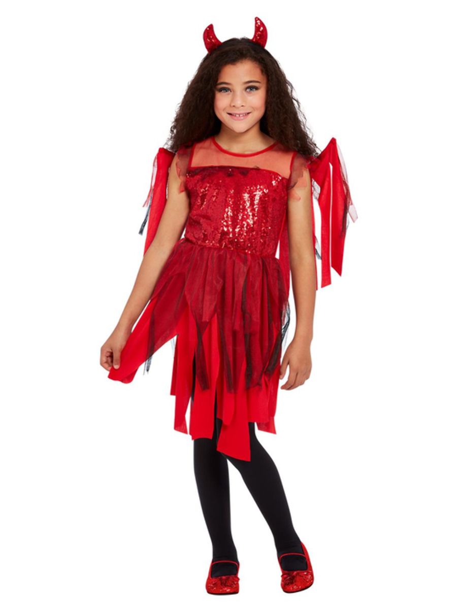 girl smiling in red devil costume